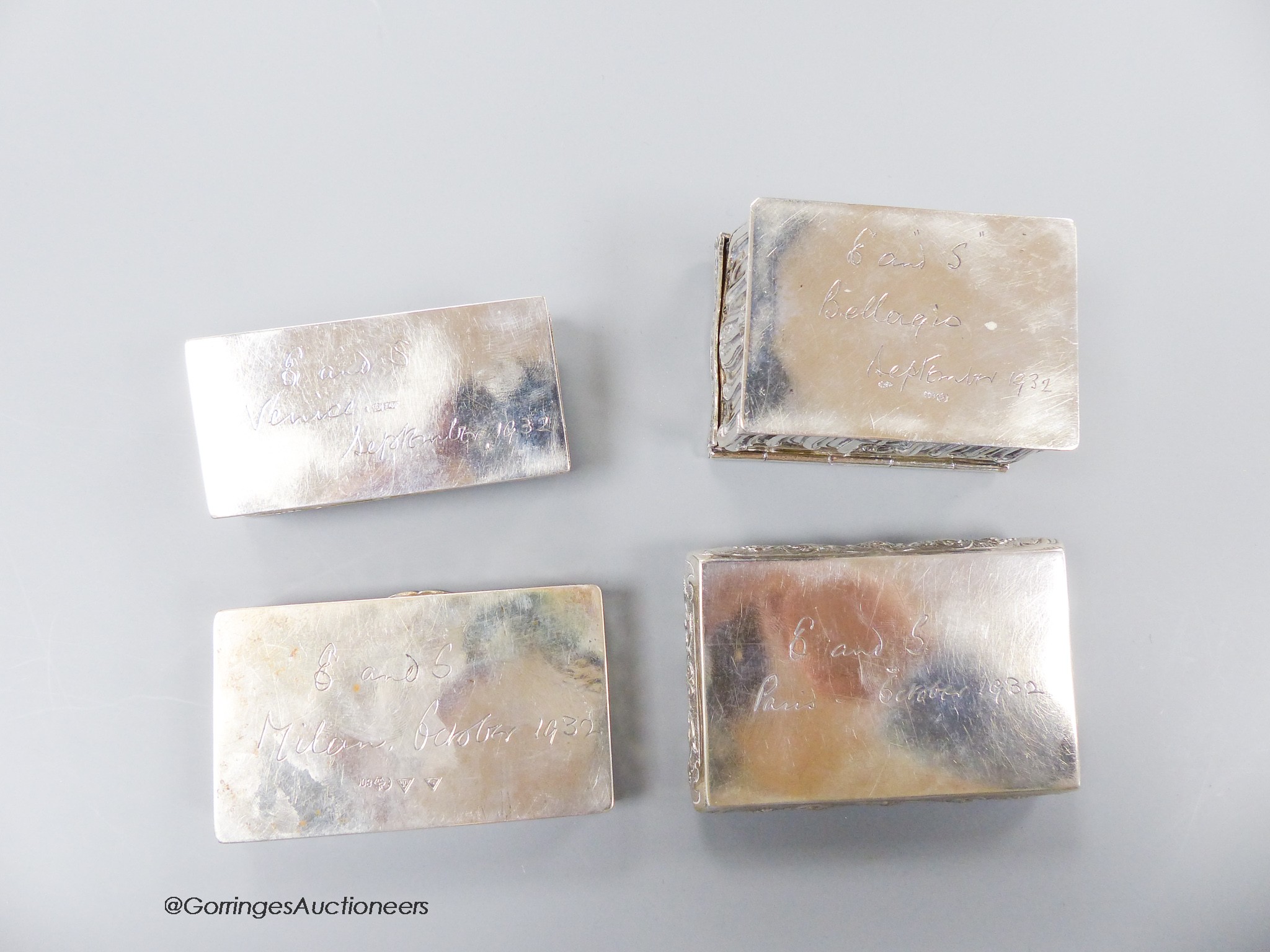 Three early 20th century German 800 standard white metal snuff boxes and one other continental white metal box, largest 86mm, 11.5 oz.